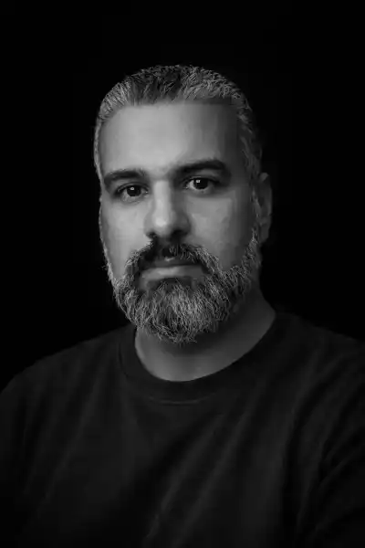 Monochrome studio portrait of a man