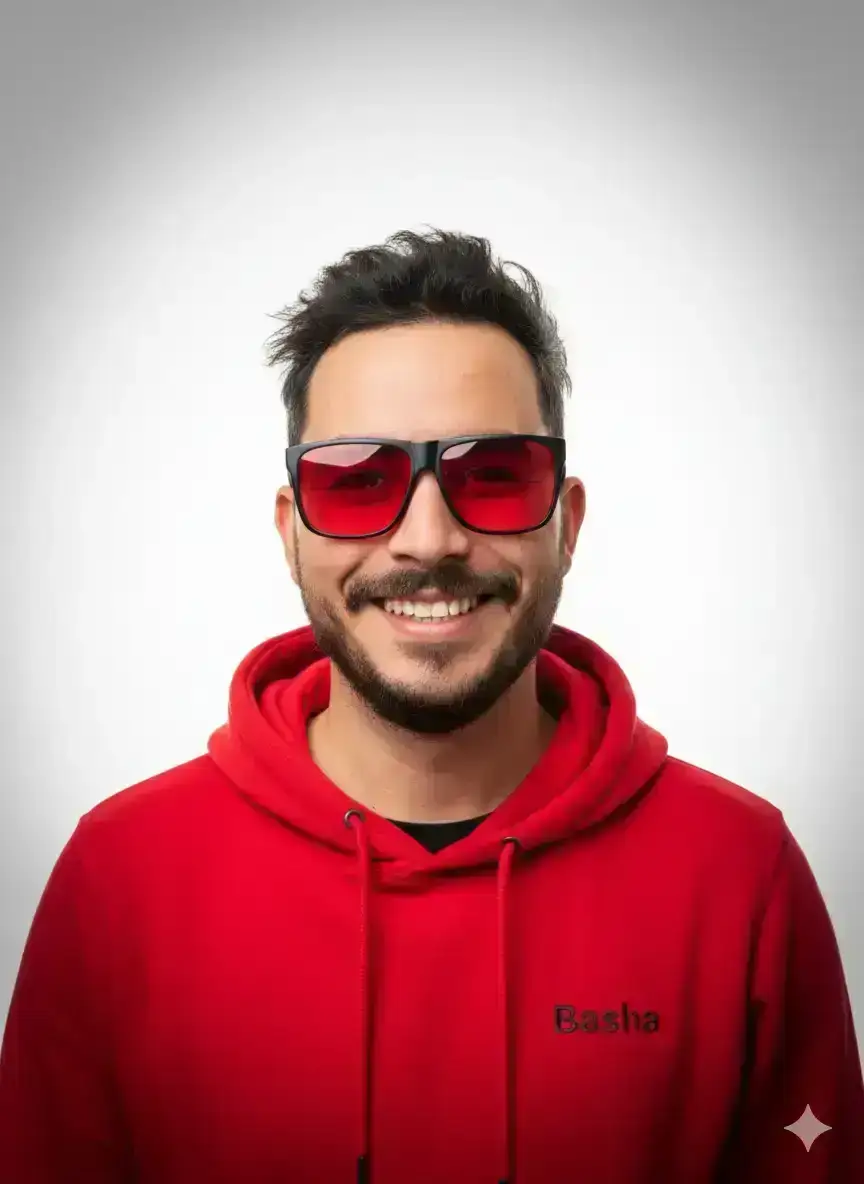 editorial portrait of a stylish young adult smiling man with messy hair