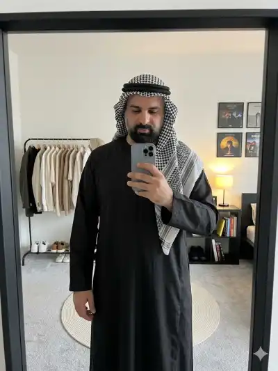 stylish young man taking a mirror selfie in a modern minimalist bedroom