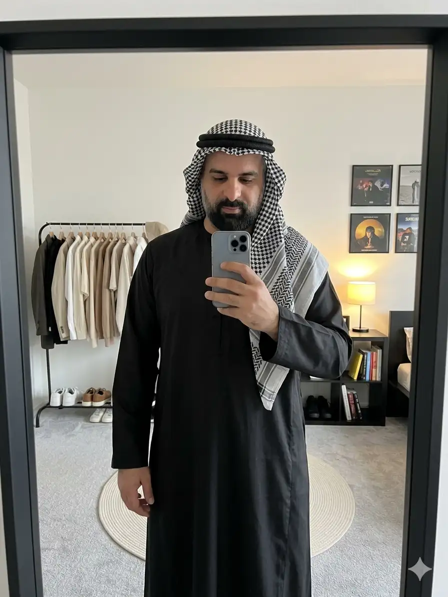stylish young man taking a mirror selfie in a modern minimalist bedroom